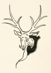 The Gump's head has long branching
antlers, an upturned nose, and a narrow beard.  Its neck is attached
to some sort of wooden plaque that can be hung on the wall.