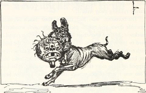Toto, a small black terrier,
is running, carrying a scoodler's head in his mouth.  The scoodler's
head is spherical, with messsy, greasy-looking hair. In place of a
node it has a mark like the club in a deck of cards.  Its teeth are
large and square and several are missing.  The scoodler's face is in
an expression of exaggerated dismay.
