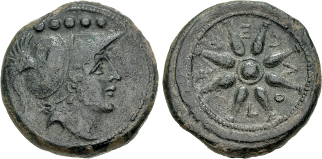 Another cruddy coin. The obverse
shows the head of a person, probably Minerva, wearing a plumed helmet.
Above the head is a
row of five dots.