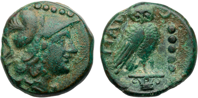 This coin is covered with green
oxide.  The obverse is another helmeted Minerva, surmounted by a
horizontal row of five dots.  The reverse has a picture of an owl,
and, on the right, a column of five dots.
