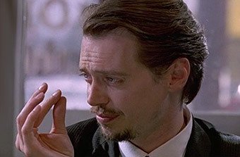 Steve Buscemi in _Reservoir Dogs_ is playing
the world's smallest violin.