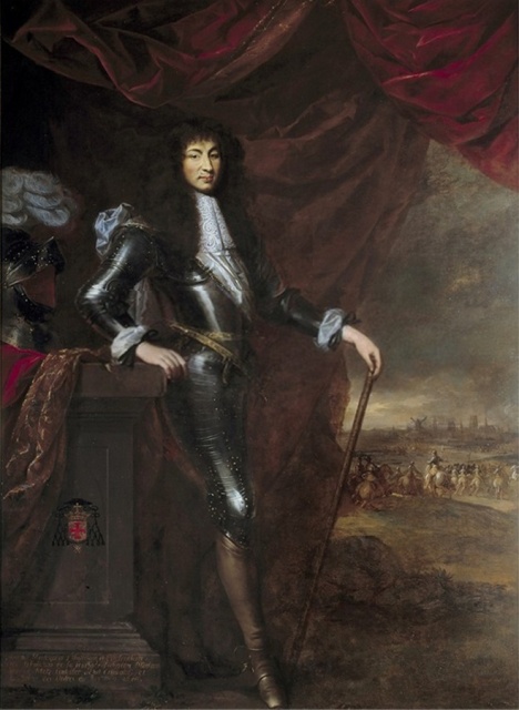 Louis as a young man.  He is standing in three-quarter profile,
displaying his entire right leg.
He is wearing tight black leather trousers
with decorative metal studs, and tight-fitting brown leather boots.