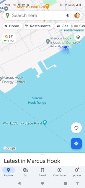 Screencap of my phone's map app, showing the same part of the river as the map above.  This one is marked with a blue dot (me) near the Marcus Hook Industrial Complex, pointed towards the tripoint, also labeled.