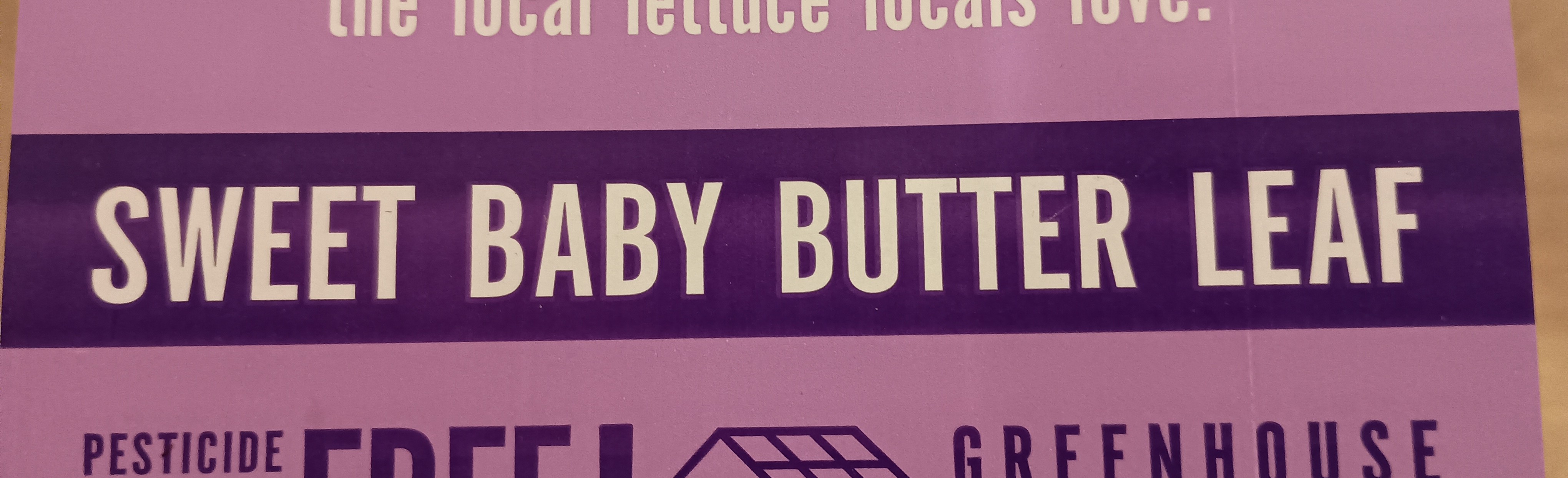 photo of part of a
package of lettuce from the supermarket.  The label says “SWEET BABY
BUTTER LEAF”