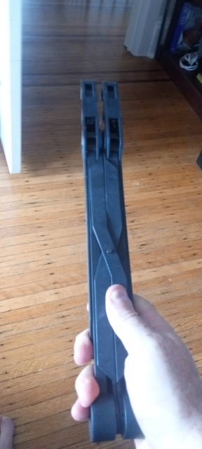 The laptop stand folded up into a compact square rod about
14 inches long and two inches across.