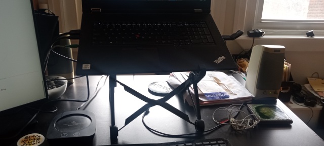 Laptop stand on my desk,
supporting an unusually large laptop.